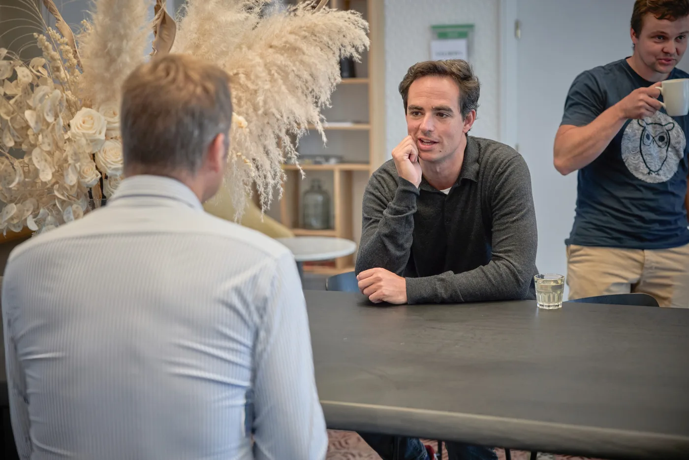 Gesprek tussen deelnemers tijdens een workshop